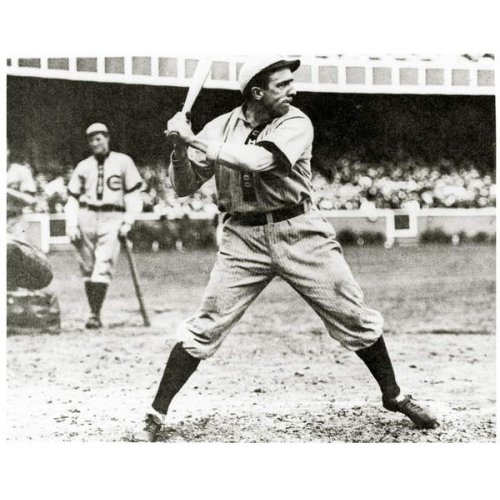 Joe Tinker de los Cachorros de Chicago en acción durante 1906